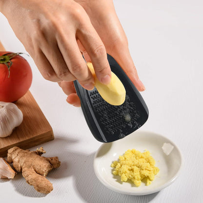 5er-Set Küchenhelfer Mini Gemüseschäler Käse Schokoraspel Pizzaschneider Knoblauch Ingwerreibe Schwarz