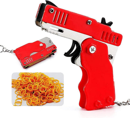 Mini Gummibandpistole Metall klappbar 6-Schuss Schlüsselanhänger