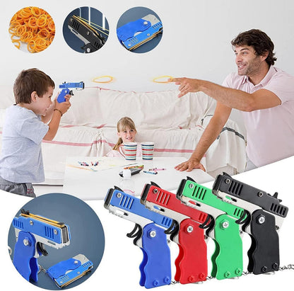 Mini Gummibandpistole Metall klappbar 6-Schuss Schlüsselanhänger