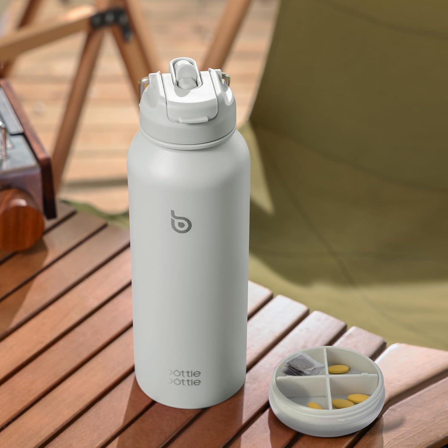 Isolierte Wasserflasche mit Strohhalm und Pillendose, 1,2