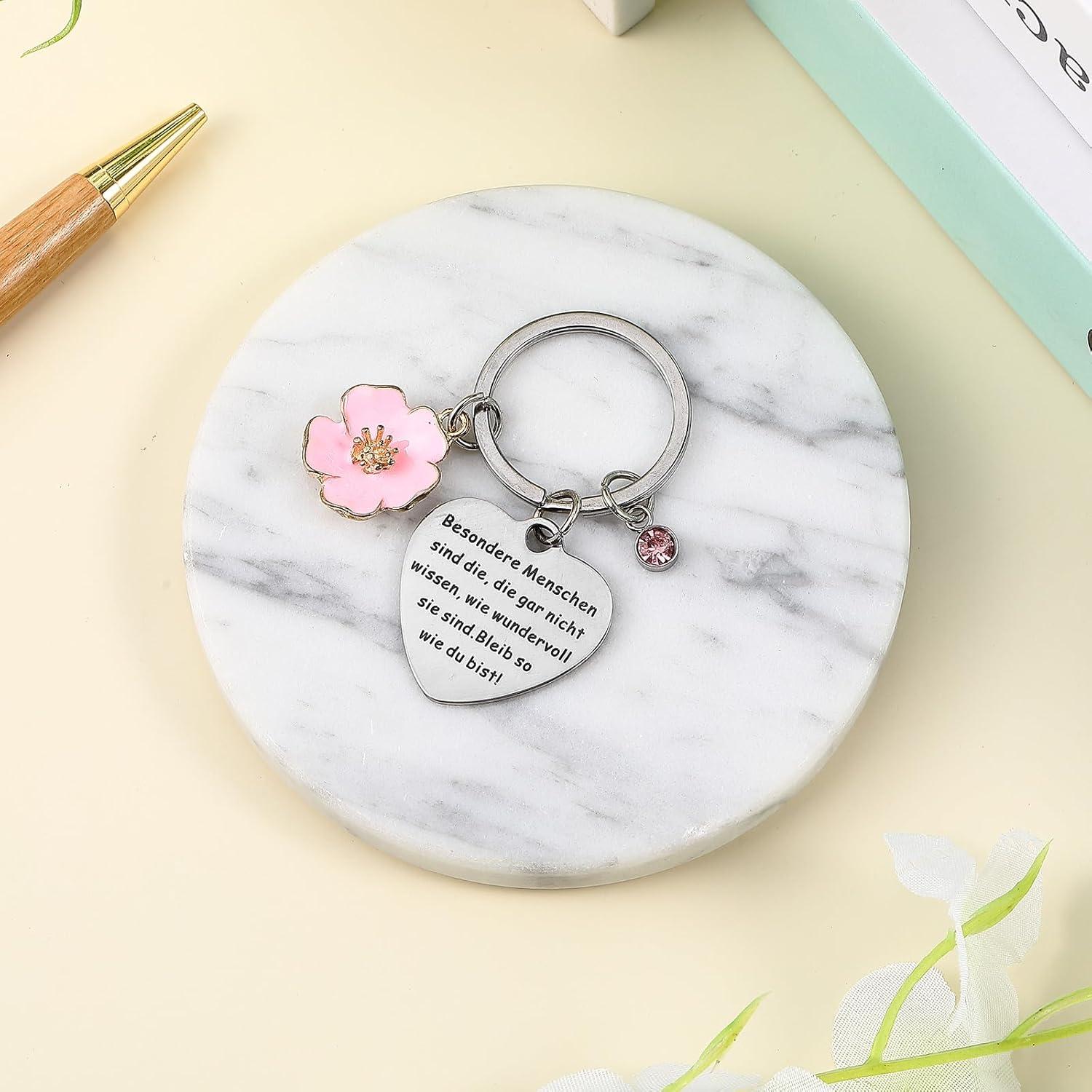 Inspirierender Schlüsselanhänger mit Rosa Diamantanhänger