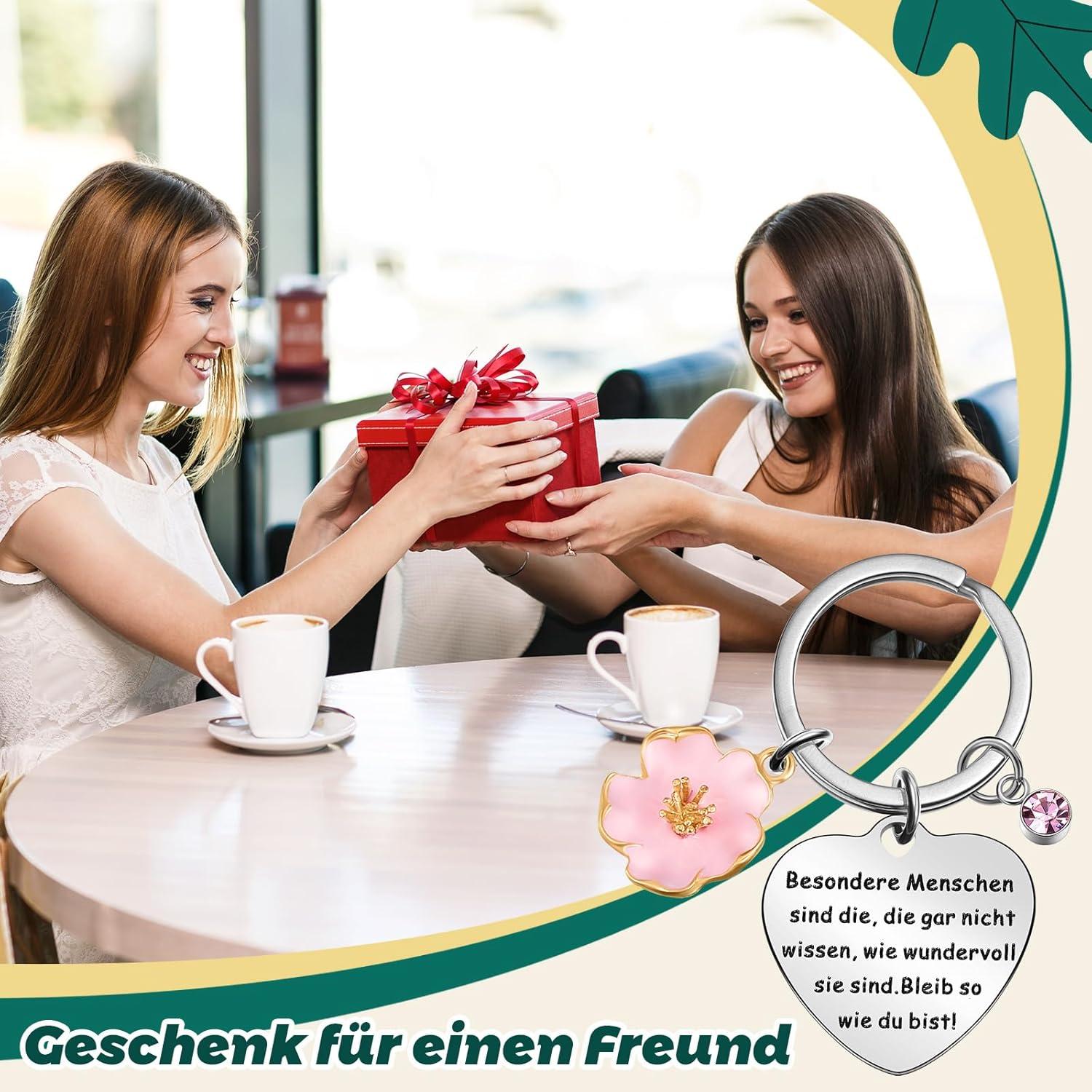 Inspirierender Schlüsselanhänger mit Rosa Diamantanhänger und Blume