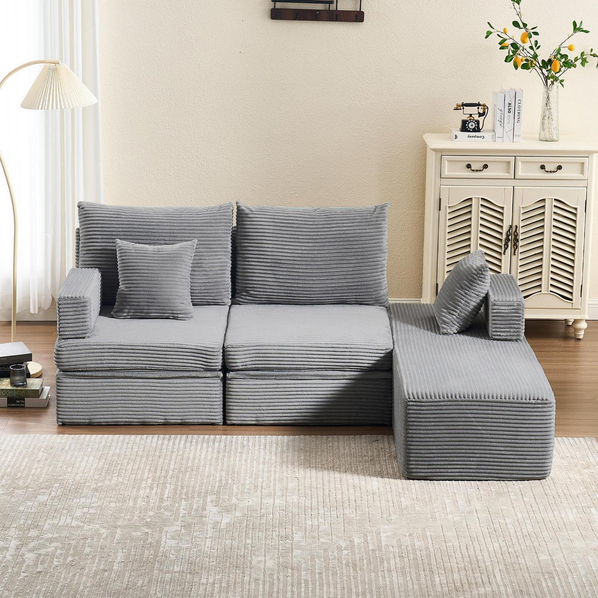 Deformierbares Ecksofa mit Fußhocker, Hellgrau