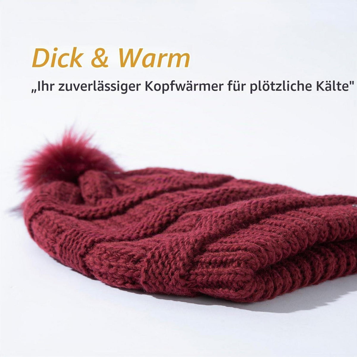 Damen Wintermütze aus 100% Wolle mit Kunstfell-Bommel und Satin-Futter